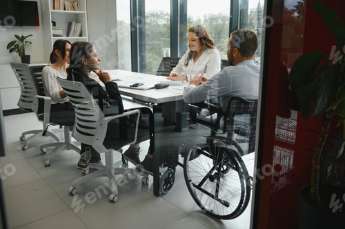 Preview: Business people working on project in office