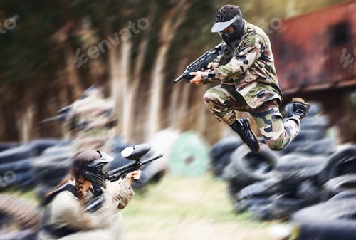 Preview: Paintball, gun or people play in a shooting game with fast action on a fun battlefield on holiday.