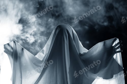 Preview: Halloween concept with ghost in smoky night