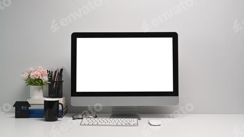 Preview: Front view of simple workspace with modern computer and office supplies.