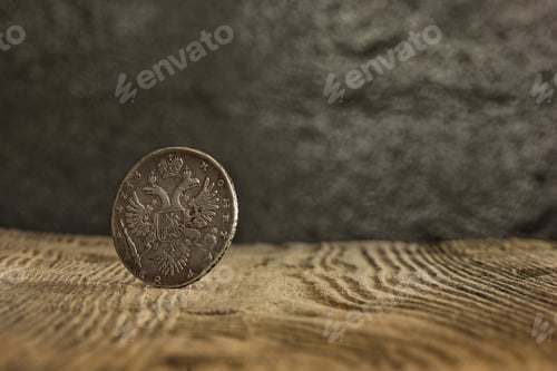 Preview: Closeup of old russian coin on a wooden background.
