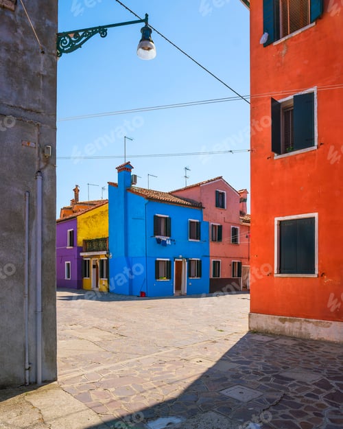 Preview: Burano island street, colorful houses in the Venice lagoon. Italy