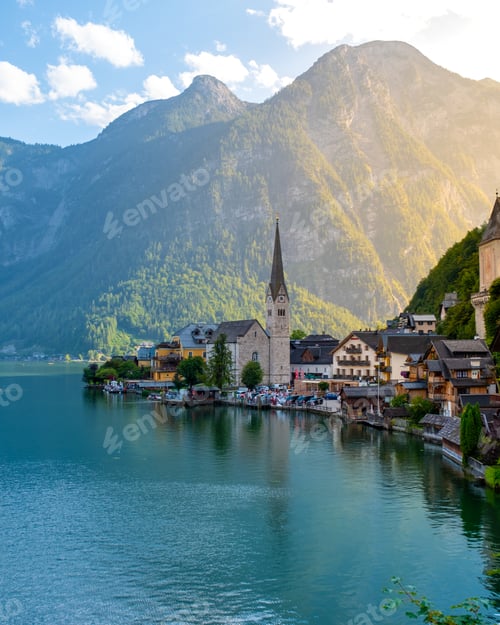 Preview: The picturesque village of Hallstatt rests along a serene lake, surrounded by stunning mountains