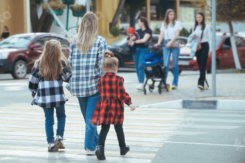 Preview: family crossing the road at a pedestrian crossing