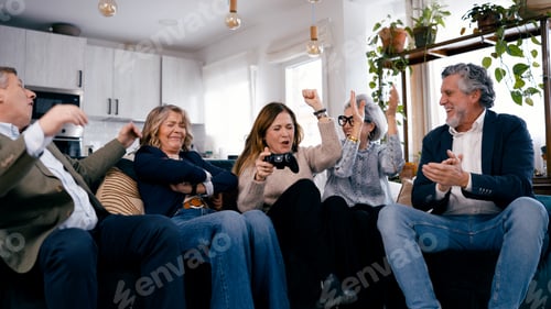 Preview: Seniors friends enjoying video game entertainment at home