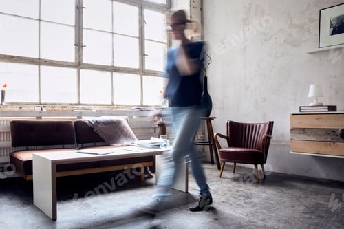 Preview: Woman walking in a loft
