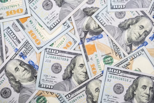 Preview: One hundred dollar bills. U.S. paper currency background.