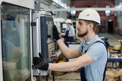 Preview: Man Repairing CNC Machine