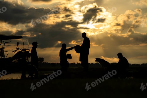Preview: Monks with alms bowls walk out to take alms food from villagers early in the morning