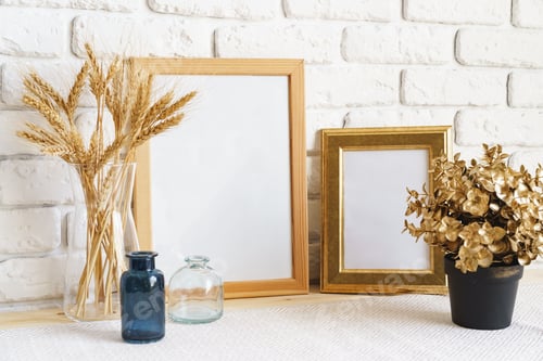 Preview: Photo frames on a brick wall background on the table with wheat ears in vase