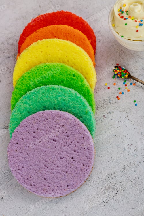 Preview: Textured color egg cake with whipped cream. Baker occupation.