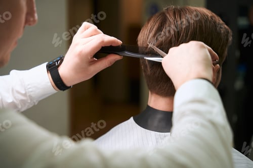 Preview: Photo of hairdresser working in modern salon