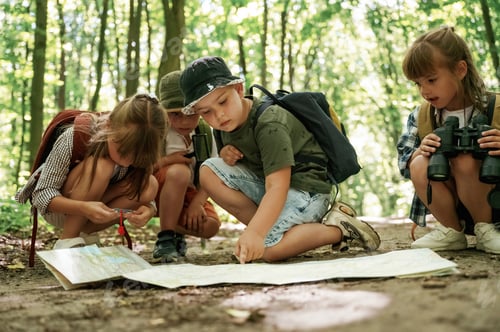 Preview: Children Exploring Forest with Map and Compass