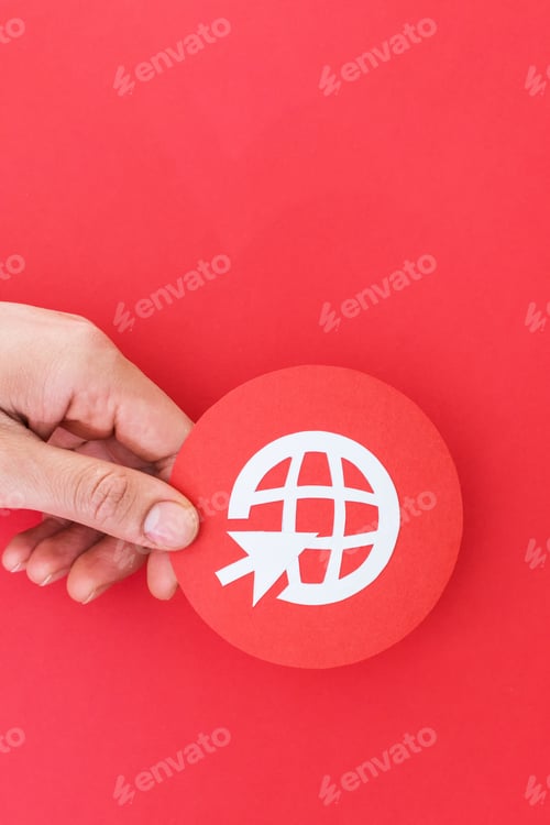 Preview: Person holding a small internet globe icon with a cursor isolated on a red background