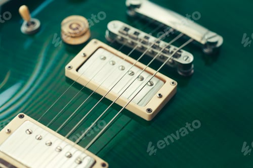 Preview: Electric guitar body and neck detail on wooden background