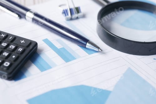Preview: Financial Analysis with Calculator, Pen and Magnifying Glass