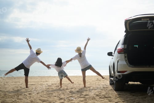 Preview: Happy Asian family travel on beach on holiday