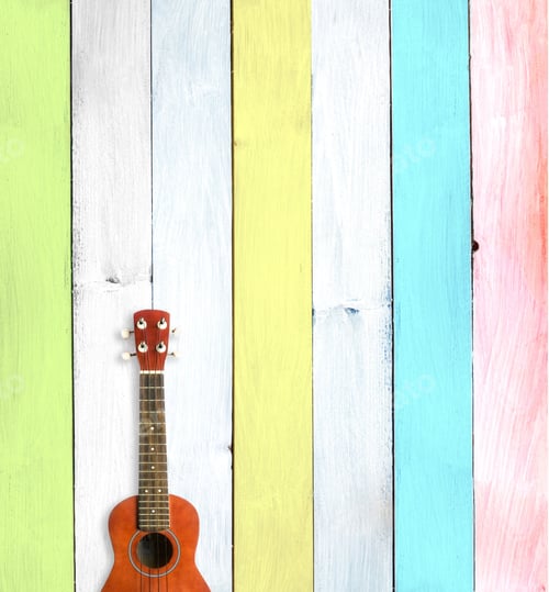 Preview: Ukulele guitar against colorful wooden backdrop
