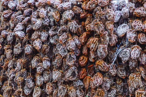Preview: Dried persimmon fruits are sold at the market. dried fruits.