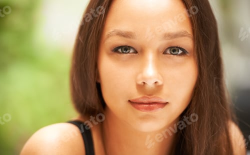 Preview: Young and beautiful. Closeup of a beautiful young womans face.