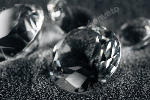 Preview: close up of transparent diamonds on grey textured background