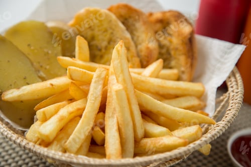 Preview: Traditional French fries with ketchup and bread