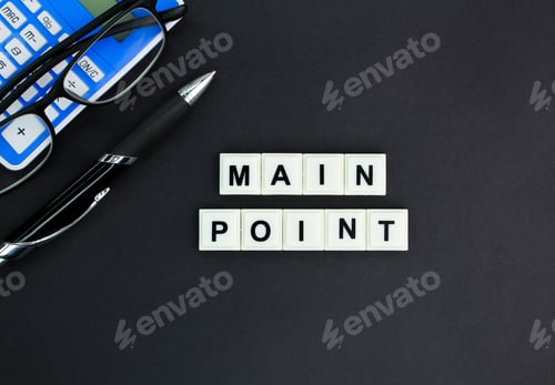 Preview: pen and alphabet letters with the word main point.
