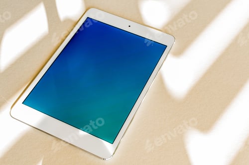 Preview: Tablet with blue screen on a desk - copy space, technology concept