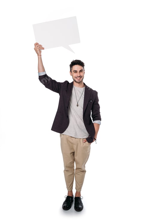 Smiling Young Man Holding a Speech Bubble