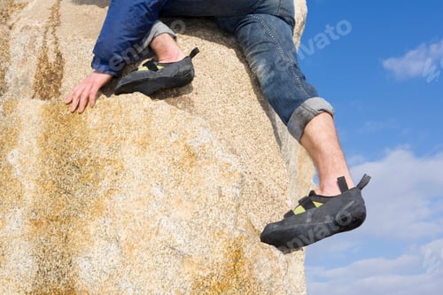 Preview: Climber free climbing boulder