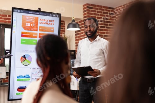 Preview: Businesspeople analyzing financial graph working at business presentation