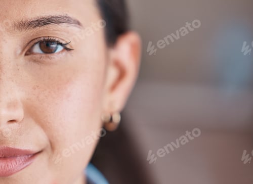 Preview: Closeup portrait of face and brown eye. Focused hispanic business woman standing in her office. Pow