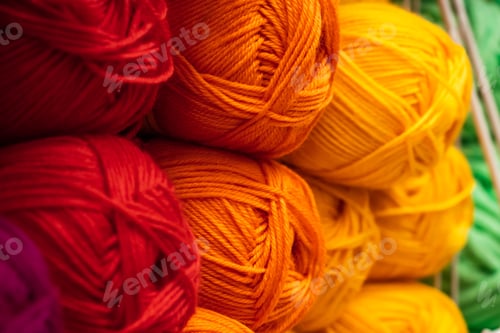 Preview: Multi-colored balls of yarn for knitting. Woolen threads for needlework.