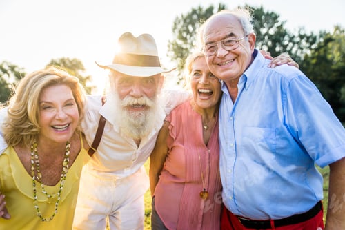 Preview: Group of senior people bonding outdoors
