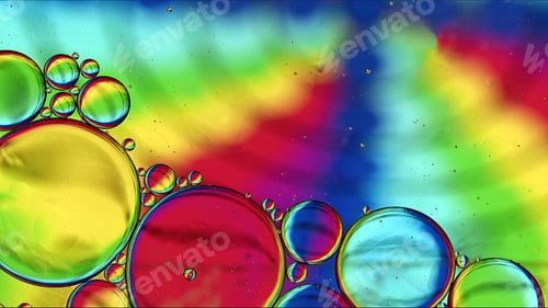 Preview: Abstract Colorful Food Oil Drops Bubbles and spheres Flowing on Water Surface
