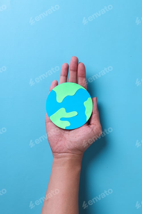 Preview: Top view of globe made from paper on palms. Save the wold.