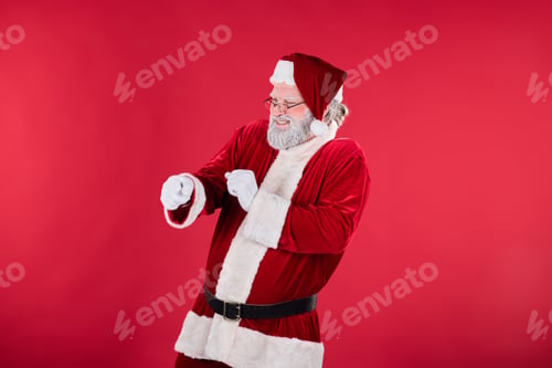 Preview: Laughing Santa Claus Pointing Against Red Background