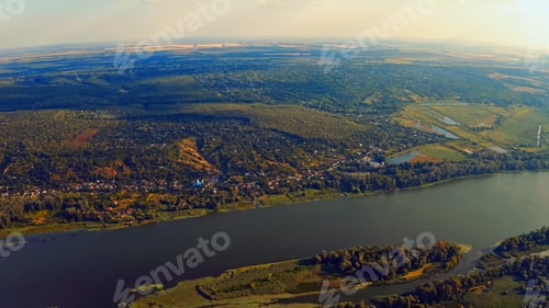 Preview: Photo from a drone of a beautiful summer landscape over the river. Beautiful summer landscape