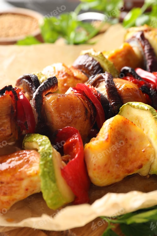 Preview: Concept of tasty food with chicken shashlik on dark textured background