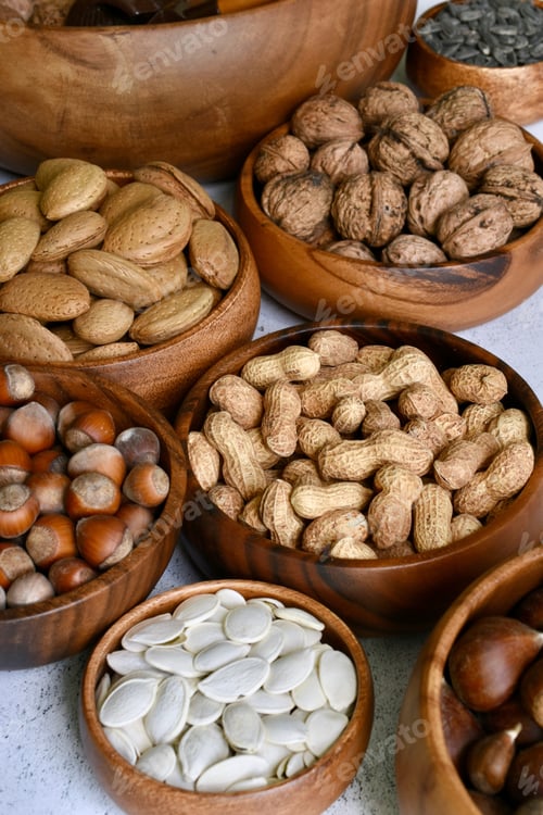 Preview: Nuts and seeds in a wooden bowls