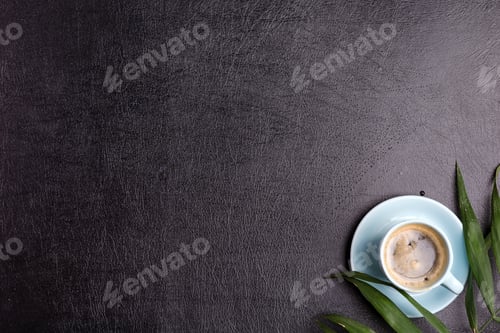 Preview: Freshly brewed aromatic coffee drink on a background from decorative black artificial eco leather