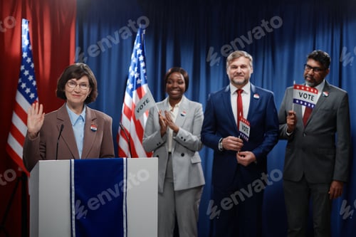 Preview: Political leader waving hand to public