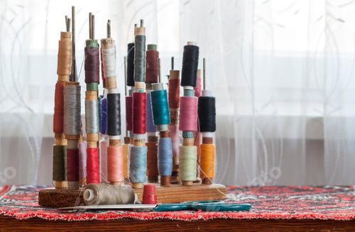 Preview: Sewing multicolored threads of soft pastel vintage colors