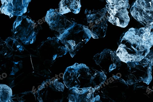 Preview: top view of frozen ice cubes with blue light isolated on black