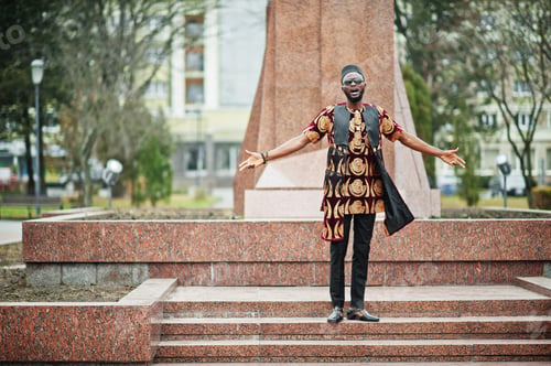 Preview: African stylish and handsome man in traditional outfit