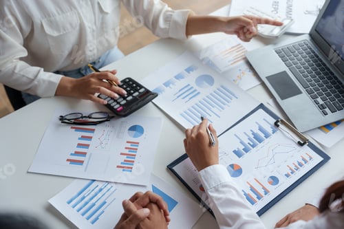 Preview: Business people point to graph and chart to analyze market data, balance sheet, account, net profit