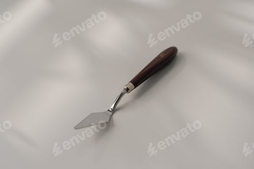 Preview: pastry spatula palette knife cooking utensils for cakes on the table on white background close-up