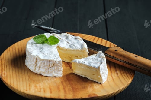 Preview: Camembert cheese with black background