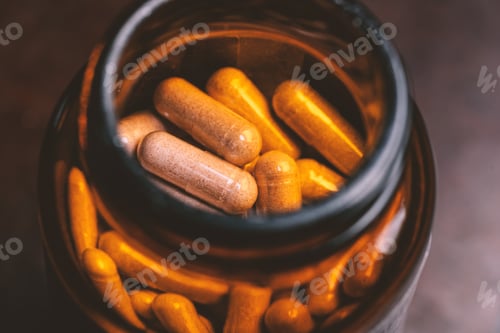 Preview: Glass bottle filed with capsule pills