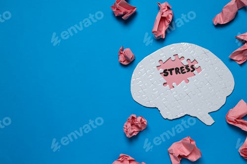 Preview: Papers, puzzle and word Stress on blue background, space for text